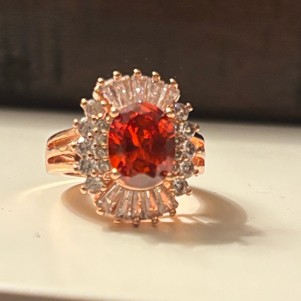 Rose Gold Ring with Red Center Stone and Halo Accents